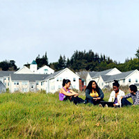 Students relaxing in the field
