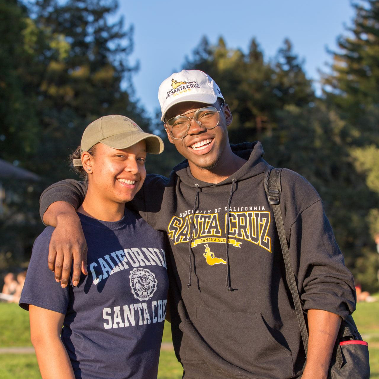 Two students smiling